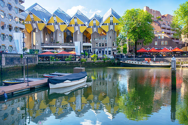 The Old Port with famous Cube houses (Kubuswoningen) on background in Rotterdam, Netherlands