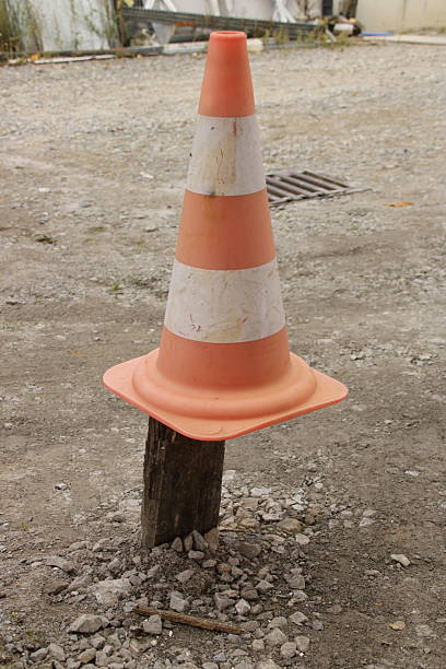 istock The wooden board is protected against being driven over with a traffic cone 2253158274