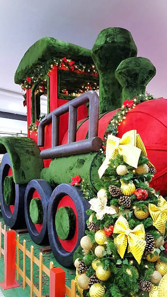 istock Decoration with giant train and Christmas tree 2253163643