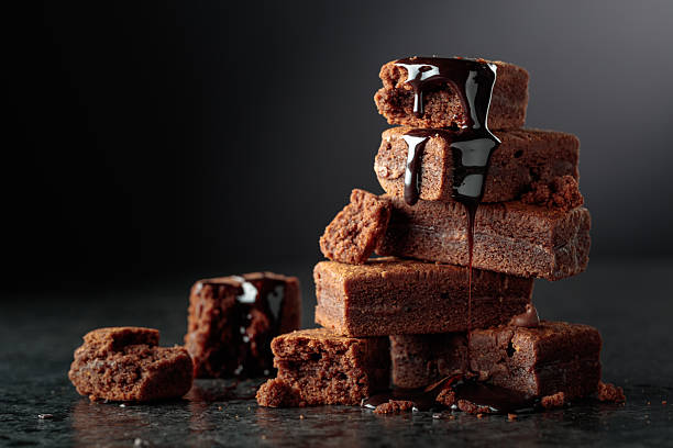 istock Brownie pieces on a black background. 2253164373