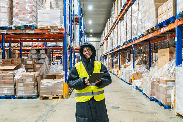 istock Woman working in cold storage logistics warehouse holding tablet 2253166761
