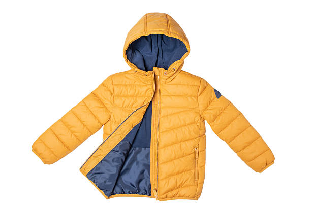 istock Childrens winter jacket. Stylish childrens yellow warm down jacket isolated on white background. Winter fashion. 2253167384