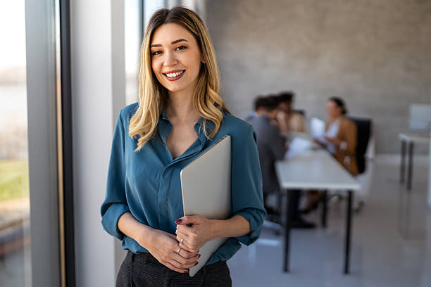 istock Professional in office environment, highlighting teamwork, collaboration, leadership, and innovation 2253169639