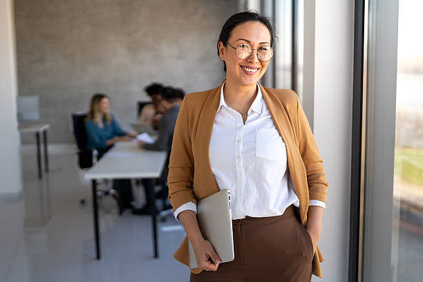 istock Professional in office environment, highlighting teamwork, collaboration, leadership, and innovation 2253169736