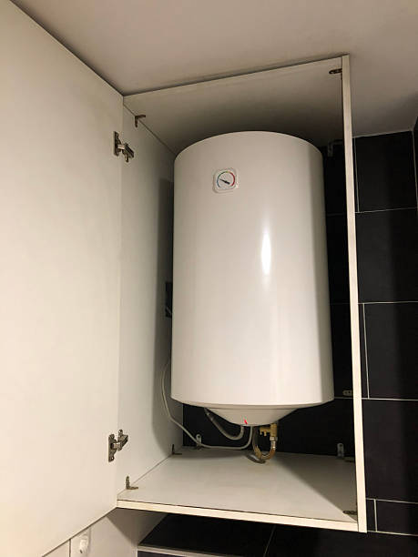 istock Wall mounted water heater inside cabinet 2253171894