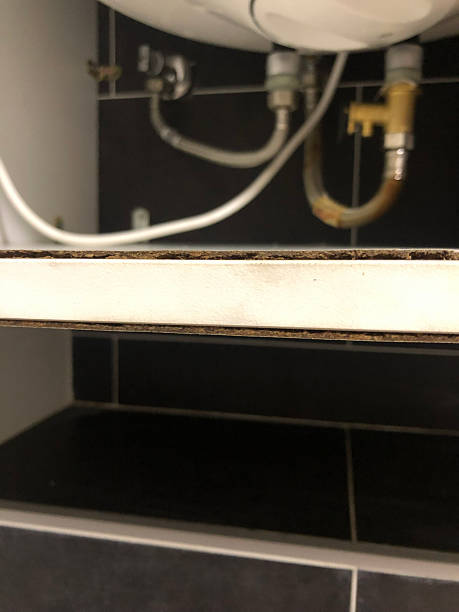 istock Water heater bottom panel and plumbing connections 2253171901