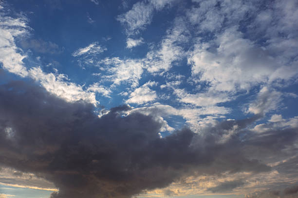 istock white and gray clouds in blue sky. 2253173189