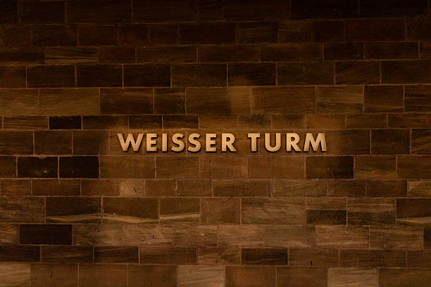Nuremberg, Germany- May 1, 2025: Weisser Turm (White tower) Nuremberg landmark U-Bahn station name sign