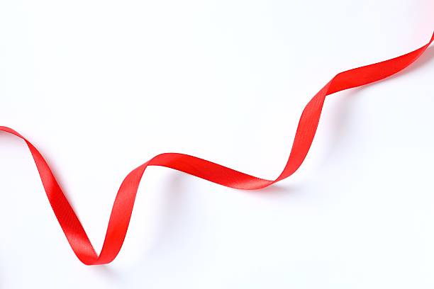 istock Red satin ribbon isolated on a white background 2253174559