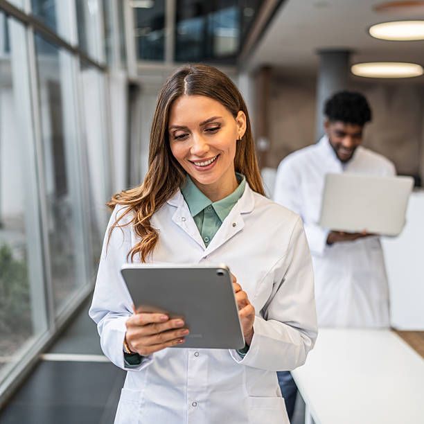 istock Female scientist using digital tablet in research lab 2253176160