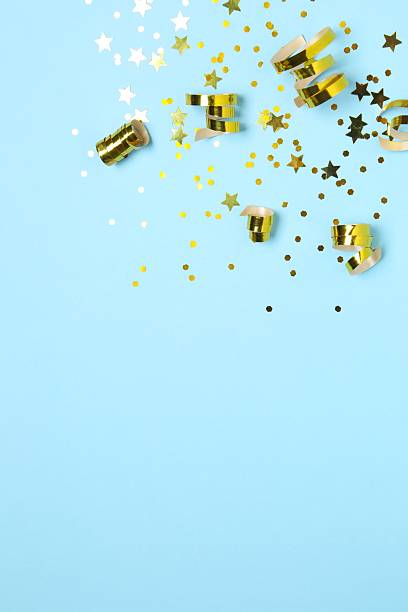 istock Golden confetti on color background, top view 2253177164