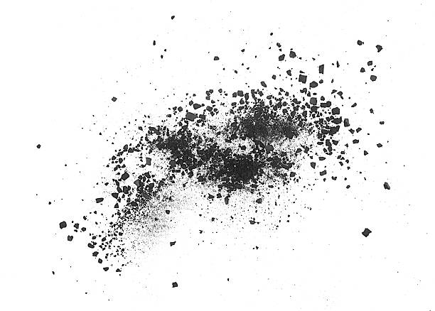 istock Black chalk pieces and dust isolated on a white background, top view. Charcoal particles. Charcoal fragments. 2253177431