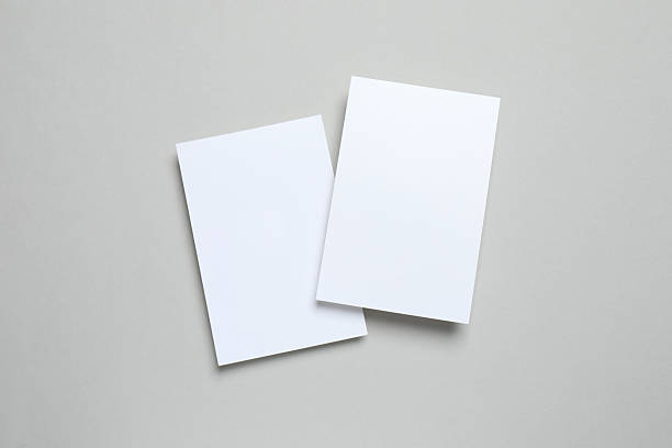 istock White cards on gray background 2253180499