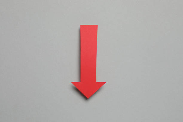 Paper arrow on color background, top view