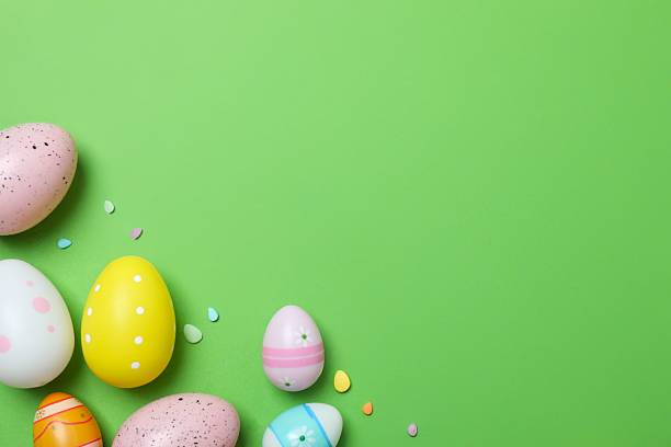 istock Happy Easter. Colorful eggs on color background, space for text or advertising 2253181534