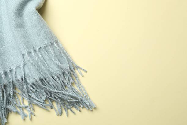 istock Warm scarf on a color background 2253181609
