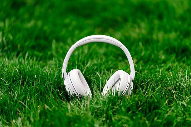 istock White wireless headphones resting on vibrant 2253185258
