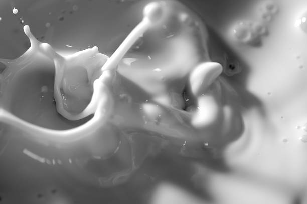Top view of Milk splash on black and white
