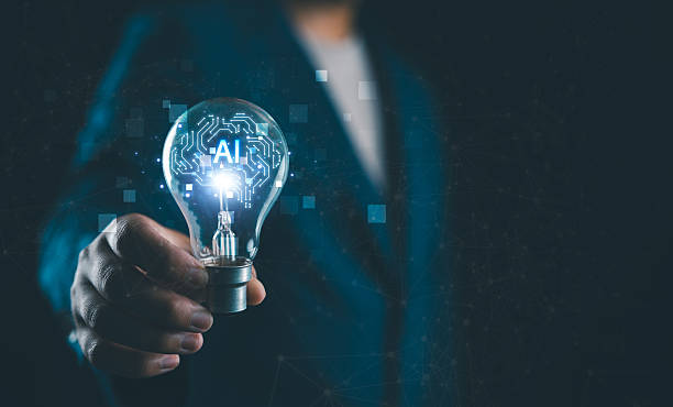 istock Businessman holding glowing light bulb with drawing brain and connection line, creative thinking ideas and innovation concept. 2253192057