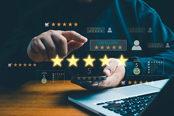 istock Customer satisfaction concept with client using smartphone to give five star rating and feedback, representing quality service, positive experience, online reviews, and brand reputation management. 2253193518