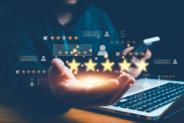 istock Customer satisfaction concept with client using smartphone to give five star rating and feedback, representing quality service, positive experience, online reviews, and brand reputation management. 2253193519
