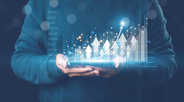 istock Businessman analyzing forex trading graphs and financial data. Concept includes stock market investments, funds, digital assets, business finance, technology, and investment strategy. 2253193612