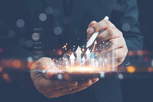 istock Businessman analyzing forex trading graphs and financial data. Concept includes stock market investments, funds, digital assets, business finance, technology, and investment strategy. 2253193673
