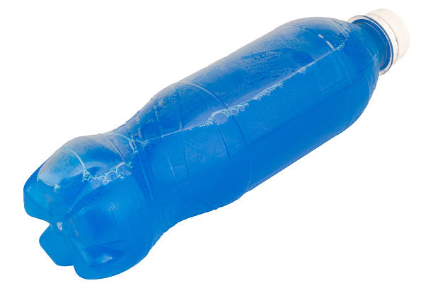 Close up of various plastic water bottles showing the cap attached to the neck isolated on white background