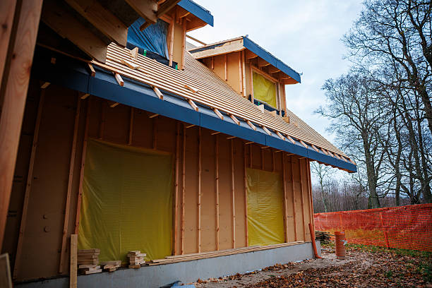 istock Timber house under construction with dormers and blue eave flashing 2253196666