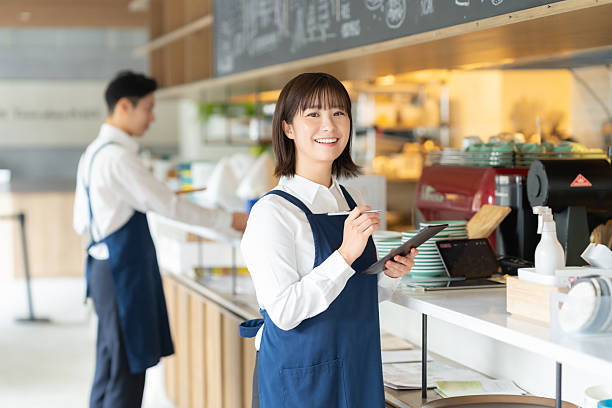 istock A female clerk working at a cafe 2253197760