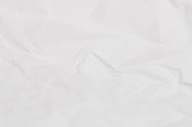 istock Clean White Recycled Paper Background Featuring Complex Crumpled Patterns and Soft Shading 2253198017
