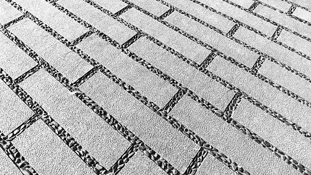 Textured background of cement floor with pebble