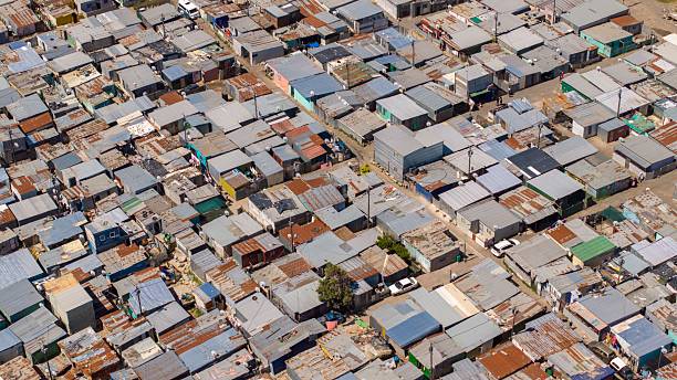 istock Drone view above a South African Township showing dense housing patterns on a hot summer day 2253198317