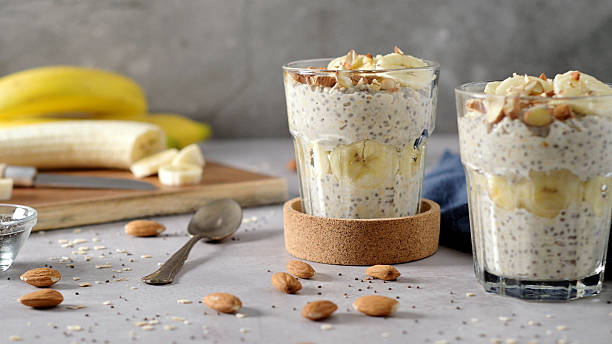 istock Healthy Chia Seed Pudding with Banana and Sliced Almonds in Glass 2253204189