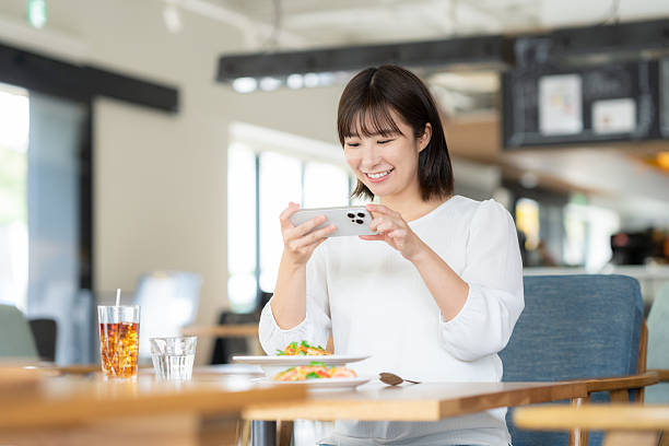 istock Young woman relaxing in a cafe 2253206101