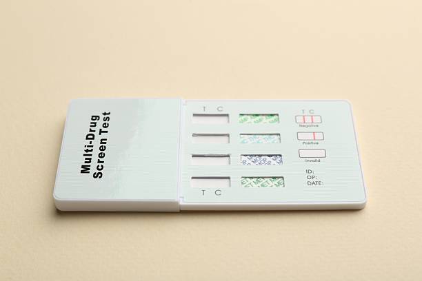 istock Multi-drug screen test on beige background, closeup 2253206950