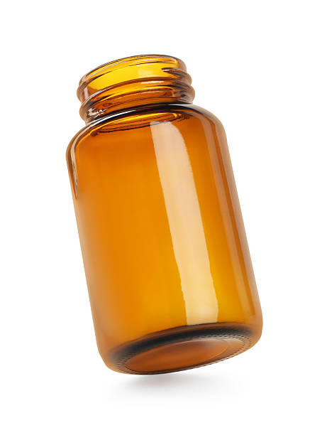 istock One glass pill bottle isolated on white 2253207958