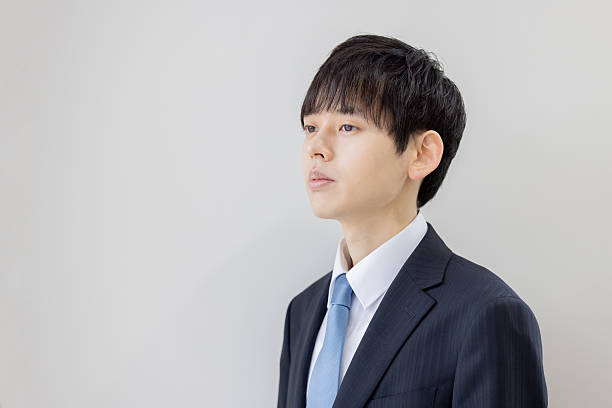 istock Overworked and depressed young businessman 2253217615