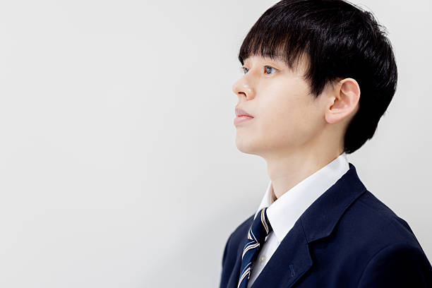 istock Portrait of a male student looking up 2253218052