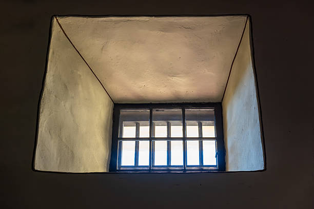 istock Interior View of Window with Vertical Grille in Spanish Mission Architecture 2253219646