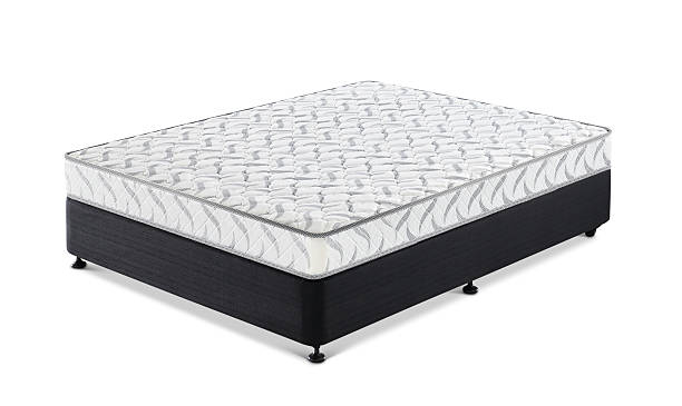 istock Comfortable white mattress on black bed base Isolated on White Background. 2253228477