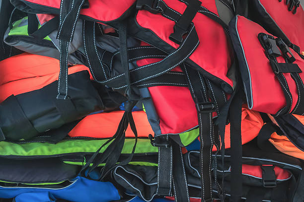 istock Multicolored life jackets stacked in a pile. Abstract background. 2253228614