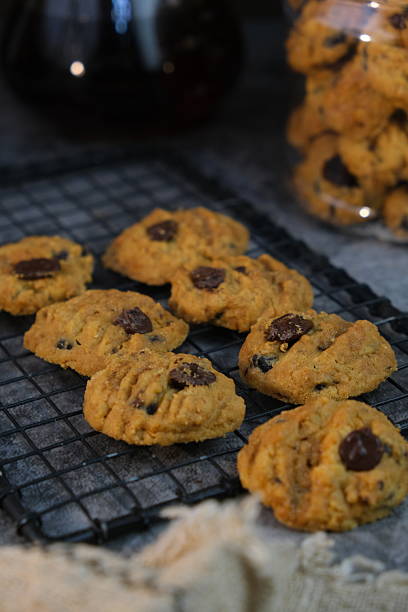 istock Popular cookies in during celebration Christmas or eid on white isolated background called chocolate chips, pineapple tart and modern cookies. 2253229285