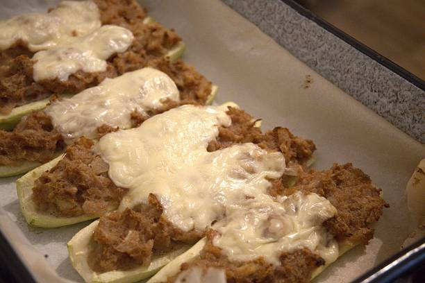 istock Stuffed Zucchini with Melted Cheese on Baking Paper 2253232853