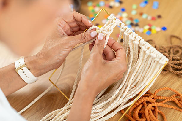 istock Weaving tapestry in a small home studio with organized materials. Highlights structure, clarity, and artistic textile development. 2253233695