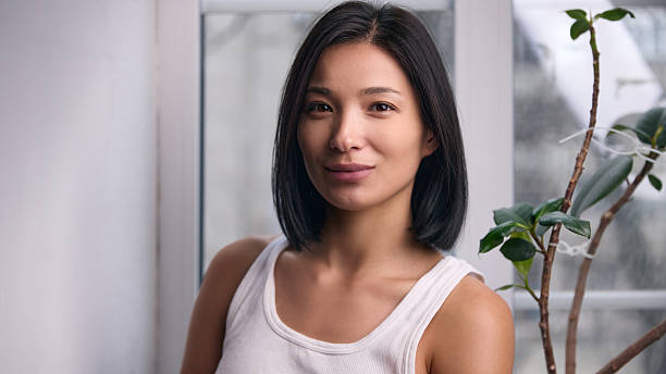 istock Natural female portrait near window with soft daylight 2253241754
