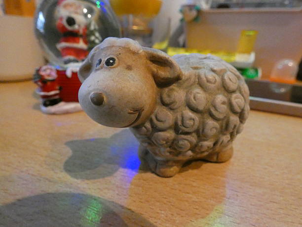 Two fluffy toy sheep