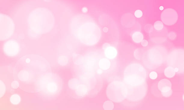 istock Christmas glowing bokeh confetti and sparkle overlay texture for your design.dust light . 2253244225