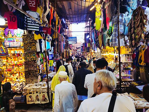 Cairo, Egypt, December 20 2025: Khan el-Khalili, a historic, sprawling bazaar in Islamic Cairo, Egypt, established in the 14th century, known for its labyrinthine alleys filled with souvenirs
