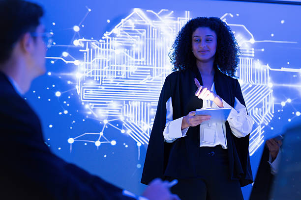 istock Professional woman presenting innovative ideas on digital technology in a modern conference room setting 2253252580